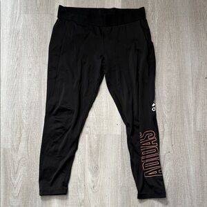 Adidas Black Leggings with Orange and White Logos.